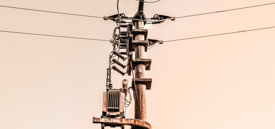 Power pole with a transformer on it