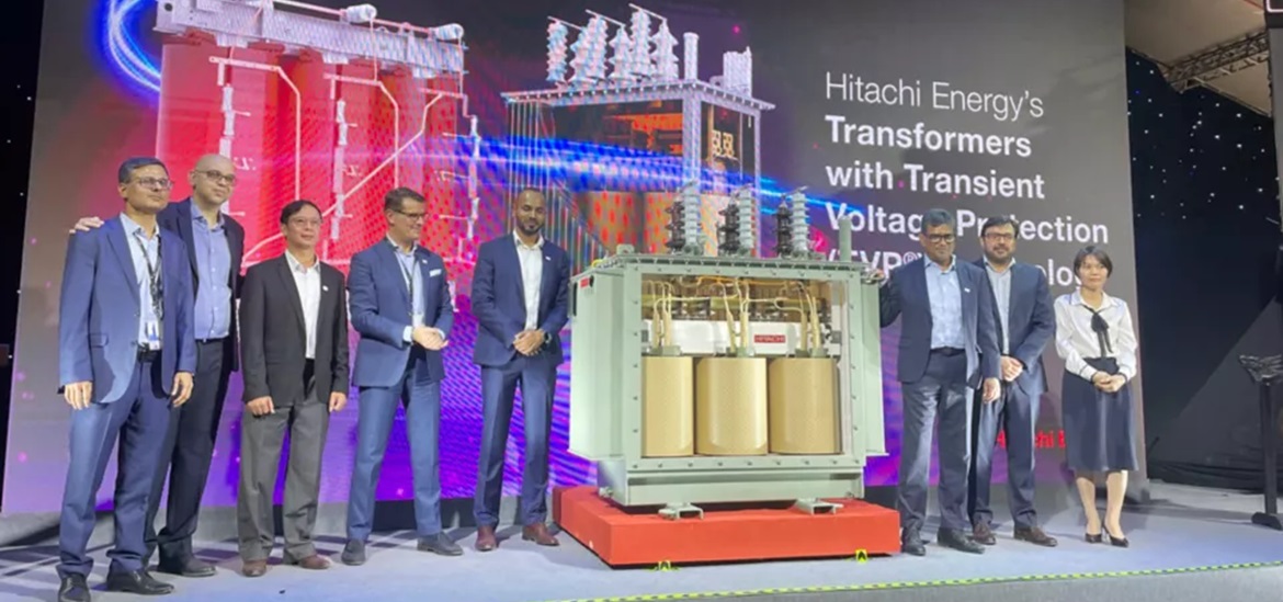 Hitachi Energy delegation presenting their liquid-filled transformers on stage