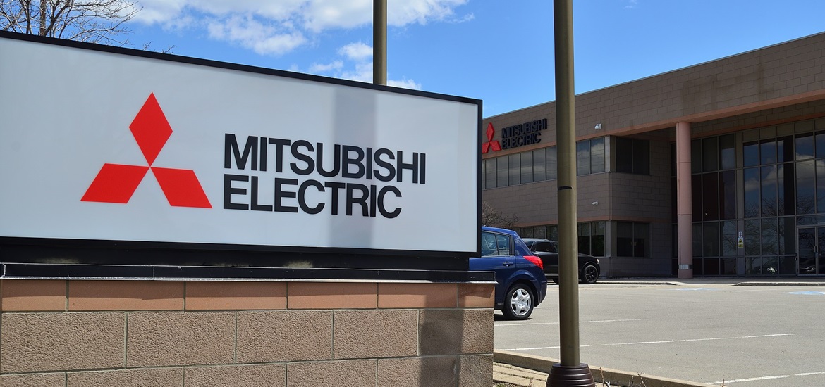 Main enterance to Mitsubisci Electric factory with their logo on