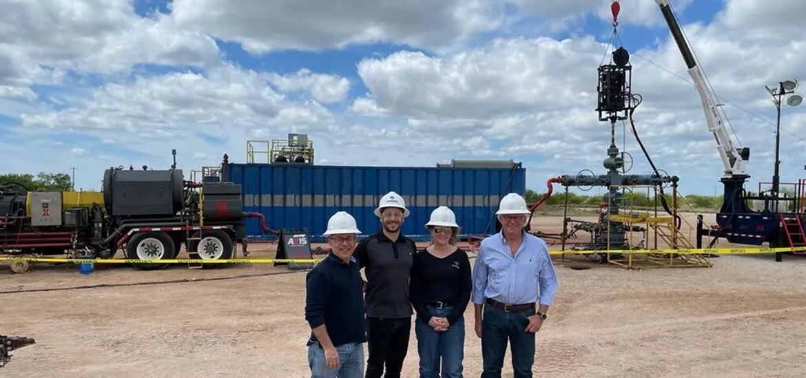 Sage Geosystems CEO Cindy Taff, shown second from right, stands with her other three male team members at the Texas test site
