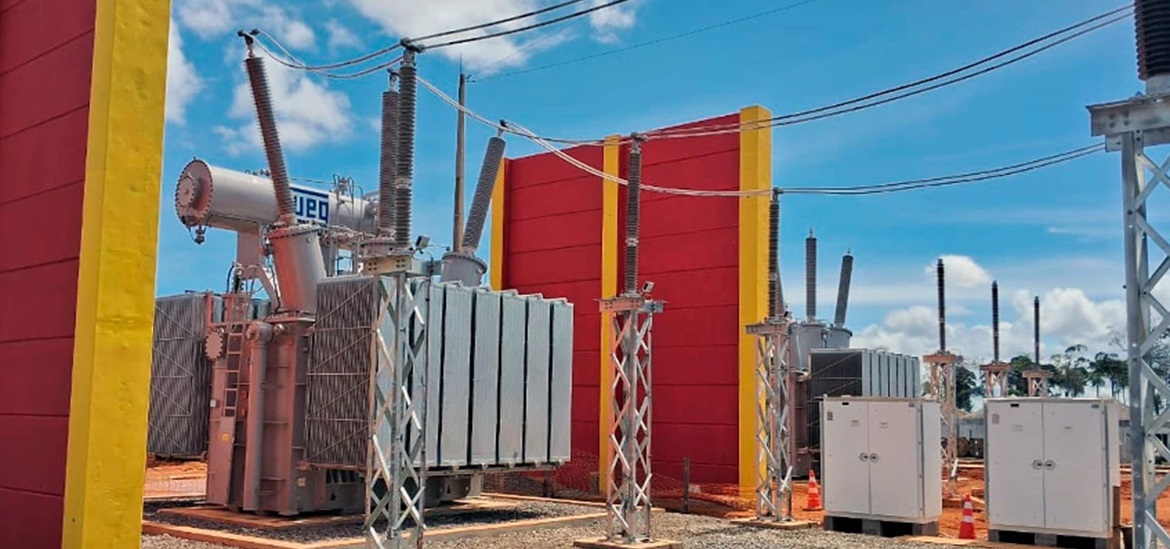 power transformers divided by red wooden walls
