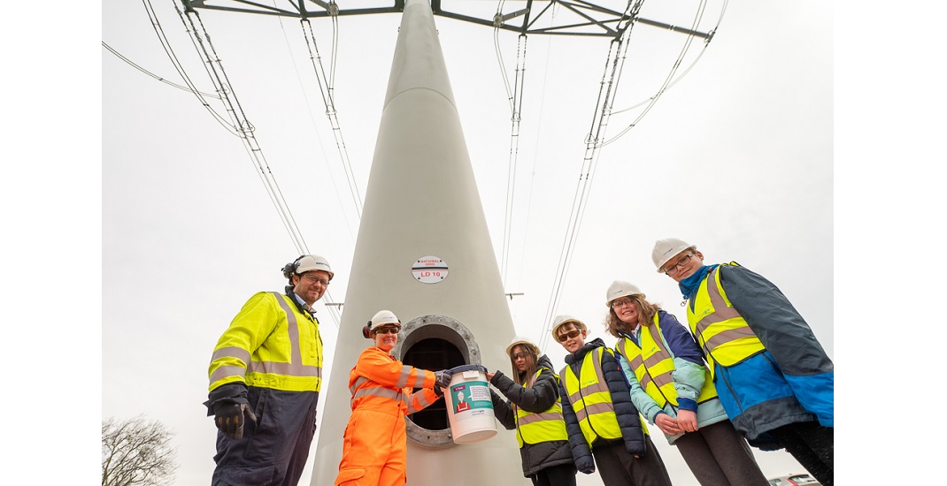 Local pupils place time capsule inside world’s first T-pylon
