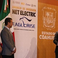 Coahuila Governor talking at the stage and looking at Eaglrise representatives