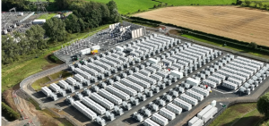 Aerial photograph of a battery energy storage system illustrating distributed energy resources used for grid flexibility.